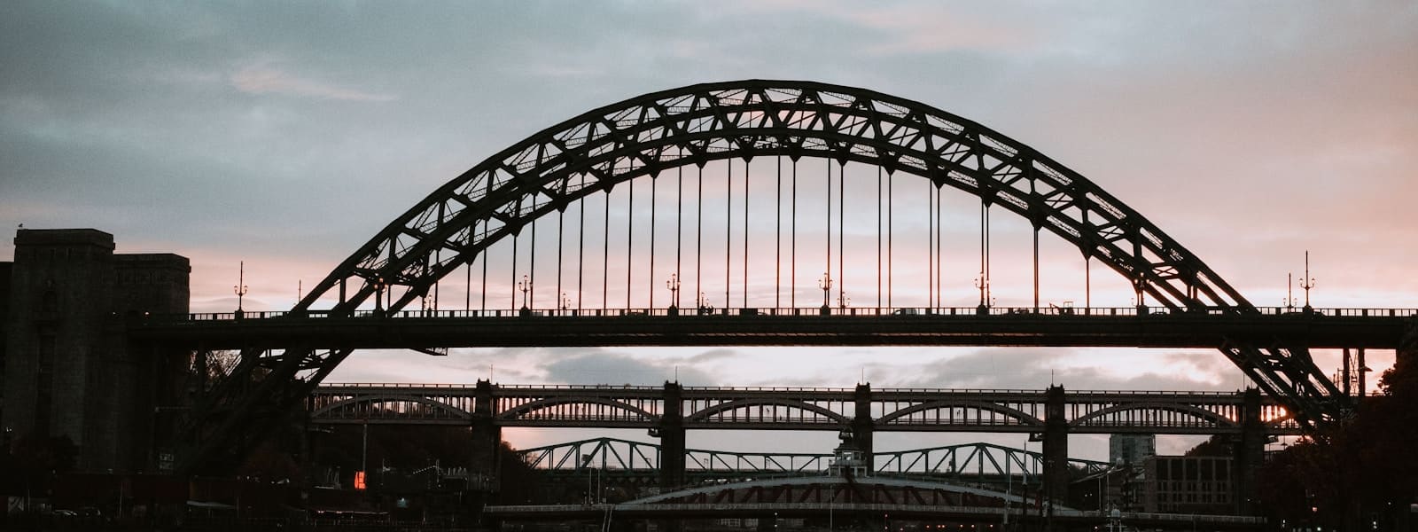 The Tyne Bridge in Newcastle against an evening sky